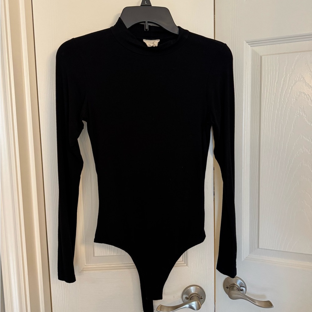 Black turtle neck bodysuit. Size small